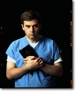 Everything was gray, regardless of the race of the victim. BUT, when you found a person with their wallet, the police would take everything out to
photograph, and you'd see these bright pristine colored pieces of plastic. 
<br/><br/>
That's also when you'd see who these people really were- what they looked like.
<br/><br/>
I felt more religious during this period. I haven't been much of a church going person, but the book represented the fact that God and faith helped get me through this.
<br/><br/>
On 9-11, there was such a feeling of helplessness... I was glad I was in a situation where I could do something.
