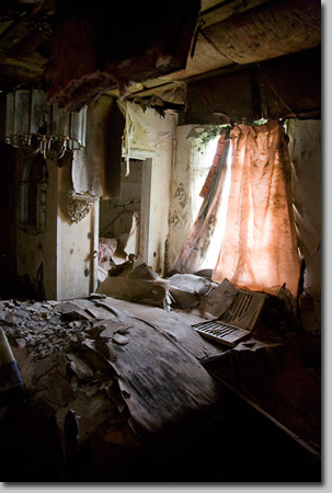 (A sign in an abandoned school library in New Orleans)<br />
<br />
Images were made in New Orleans in 2006, six months after Katrina, in abandoned houses, schools and apartments in the Little Woods, Lower Ninth Ward, and St Claude neighborhoods. Students left classrooms on Friday, August 26, 2005, and never returned. Homes were vacated with stunning rapidity. Mold and government apathy obliterate evidence of the lives left behind.